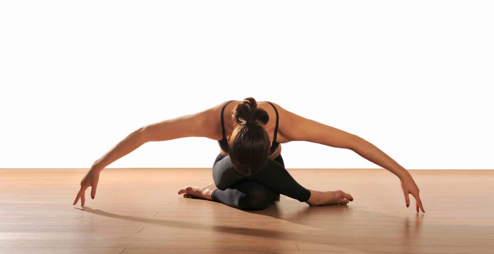 woman practising yin yoga