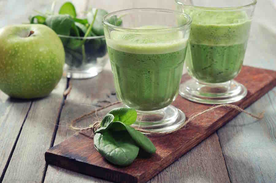 Healthy green smoothie with green apples and spinach